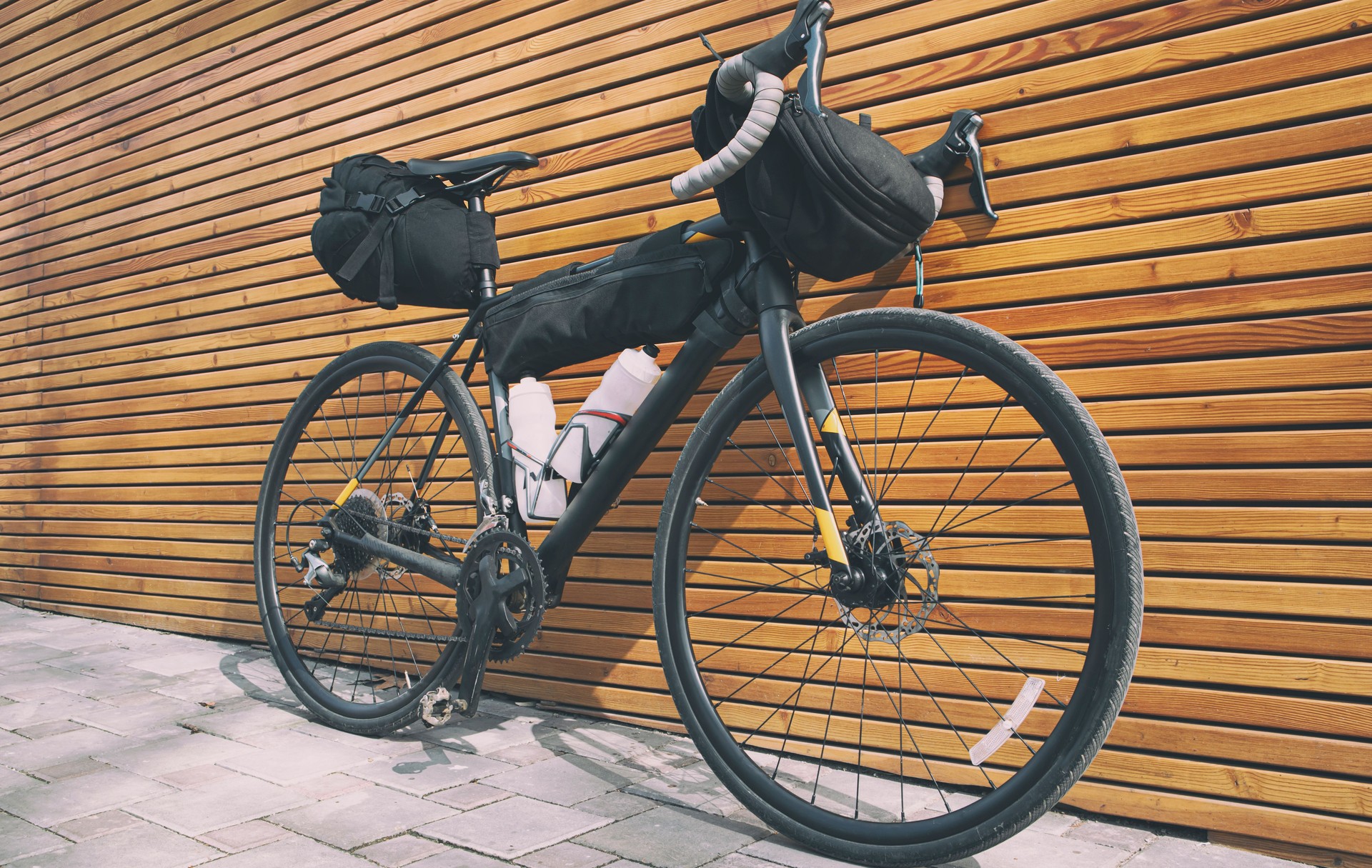 The bicycle packed with a lot of bags and other equipment ready for adventure and travel